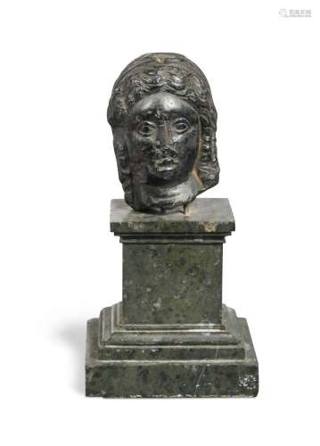 A black carved stone head (305 – 30BC Ptolemaic dynasty),