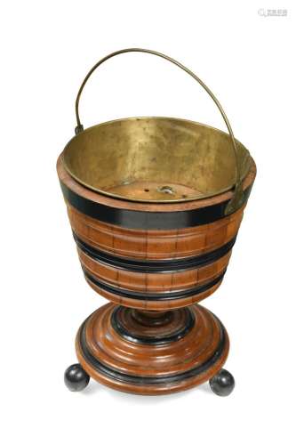 A Dutch walnut and ebonised "teestoof" bucket, 19t...