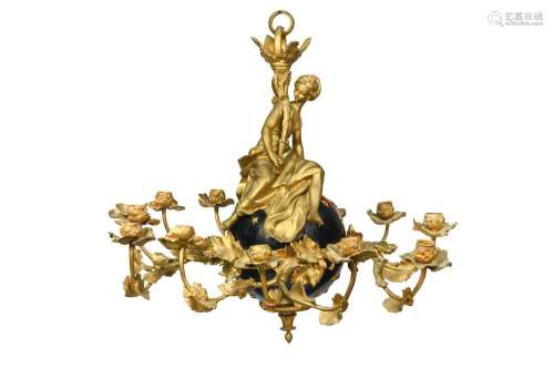 A French gilt and bronze fifteen light chandelier, 19th cent...