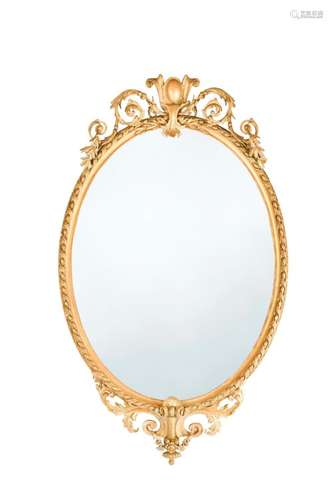 A gilt and gesso oval wall mirror, late 19th century,