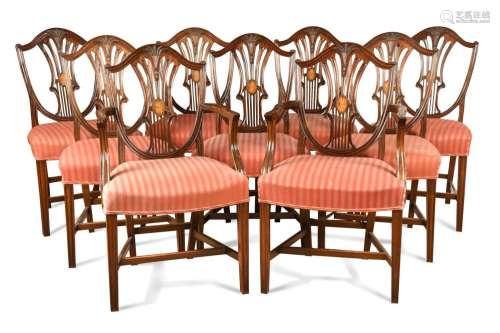 A set of twelve mahogany shield back dining chairs, 19th cen...