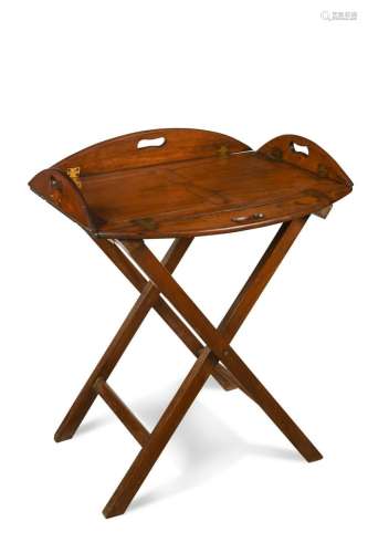 A mahogany butlers tray on folding stand, 19th century,