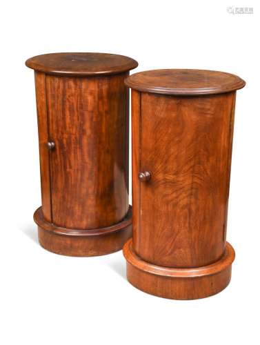 A near pair of cylindrical mahogany pot cupboards, 19th cent...