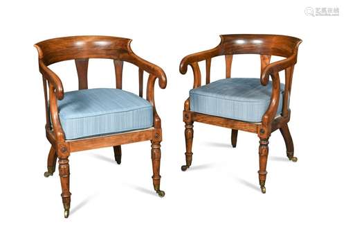 A pair of late Regency mahogany armchairs,