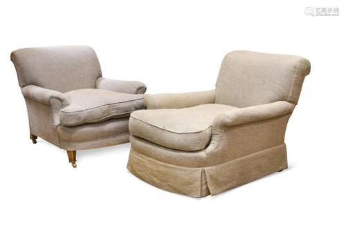 A near pair of Howard & Sons armchairs,