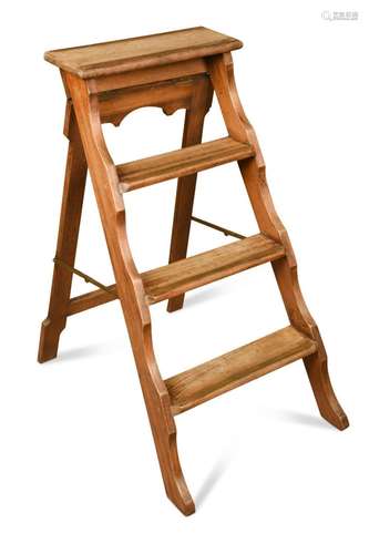 A set of mahogany and brass folding library steps, circa 190...