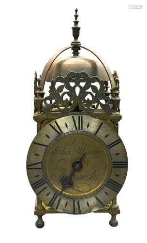 A brass lantern clock signed 'Thos Moore Ipswich',