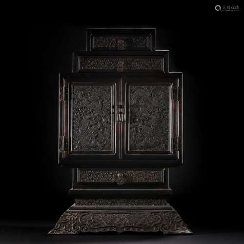 A Chinese Carved Rosewood Cabinet