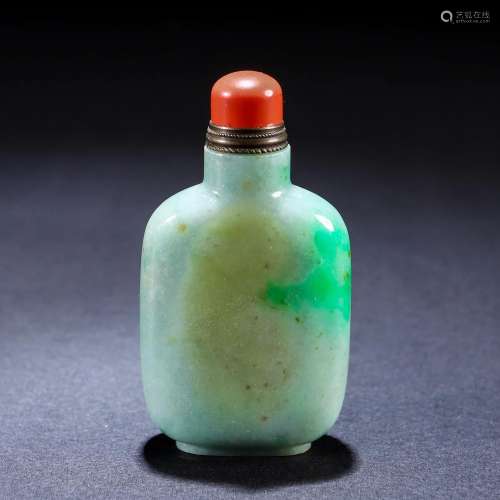 A Chinese Carved Jadeite Snuff Bottle