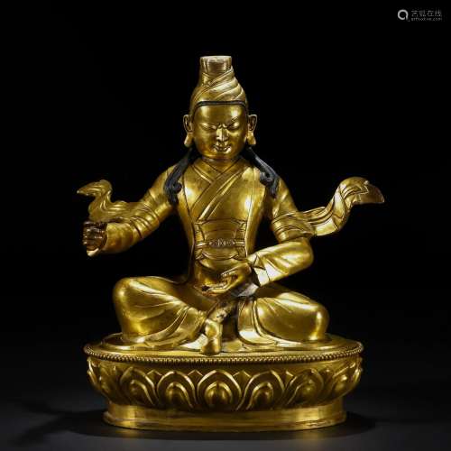 A Chinese Bronze-gilt Seated Master