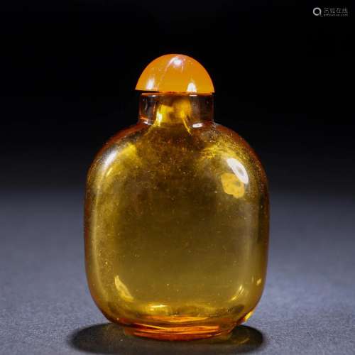 A Chinese Carved Peking Glass Snuff Bottle