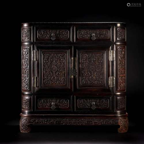 A Chinese Carved Rosewood Cabinet