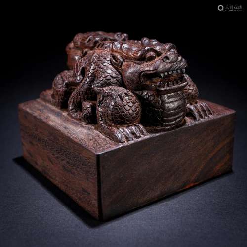 A Chinese Carved Aloes-wood Beast Seal