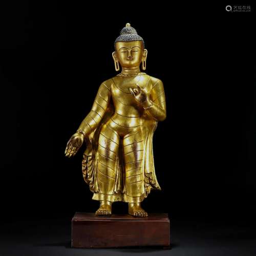A Tibetan Bronze-gilt Standing Shakyamuni