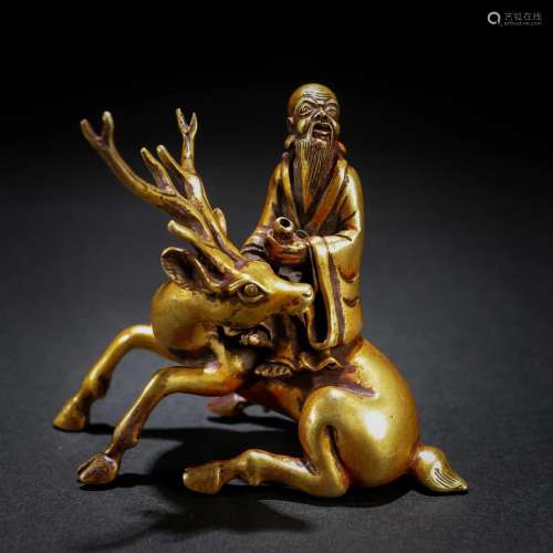 A Chinese Bronze-gilt God of Longevity