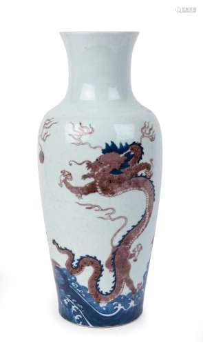 A Chinese blue and white porcelain dragon vase with copper r...