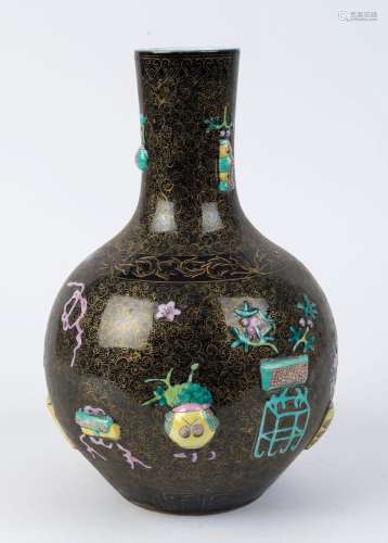 A Chinese spherical porcelain vase with polychrome glaze on ...