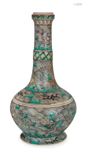 A famille verte Chinese porcelain bottle vase decorated with...