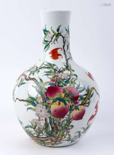 A Chinese spherical porcelain vase decorated with peaches, h...