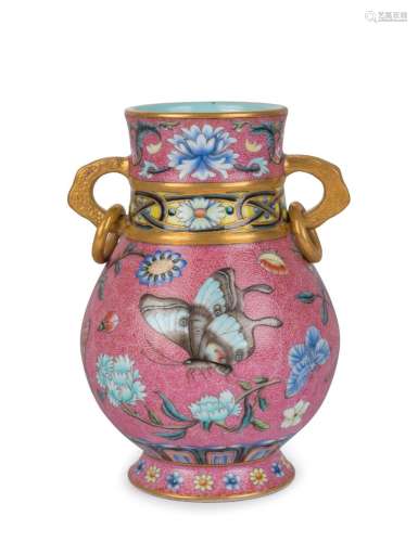 A Chinese porcelain vase decorated in enamel with butterflie...