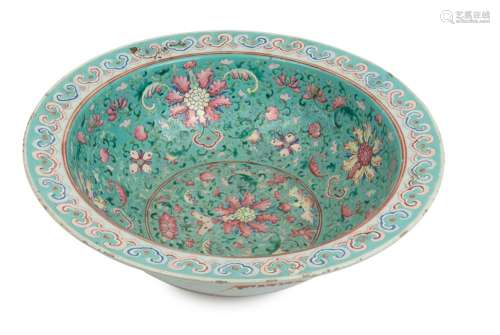 A Chinese polychrome enamel basin adorned with flowers and p...