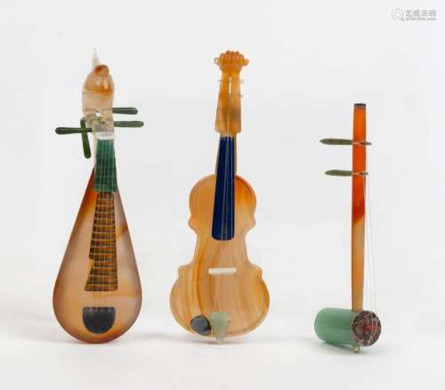Three Chinese hardstone miniature musical instrument ornamen...