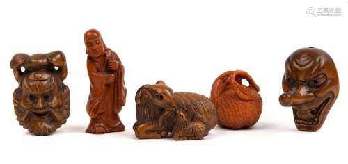 Five assorted netsuke, carved boxwood, some with glass eyes,...