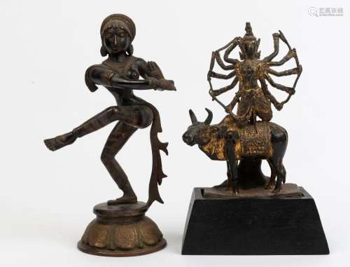 An Indian bronze dancing figure, together with a South East ...