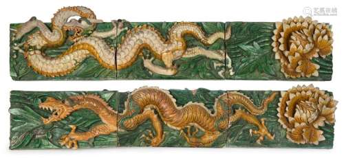 A stunning pair of antique Chinese ceramic architectural pan...