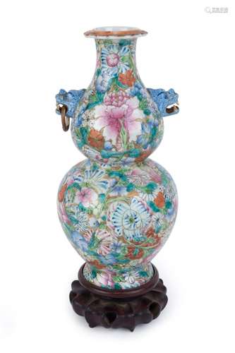 An antique Chinese double gourd shaped porcelain vase with e...