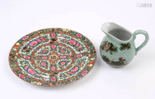 A Chinese Canton porcelain plate and a celadon jug, 20th cen...