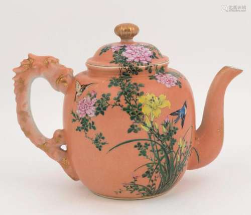 A Chinese porcelain teapot with enamel decoration on salmon ...