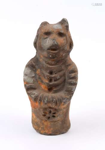 An ancient Chinese Neolithic pottery deity statue, 5000 B.C....