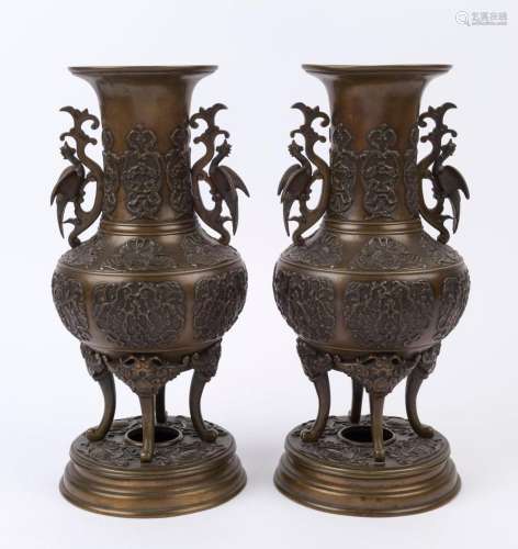 A pair of Chinese bronze mantel vases with phoenix handles, ...