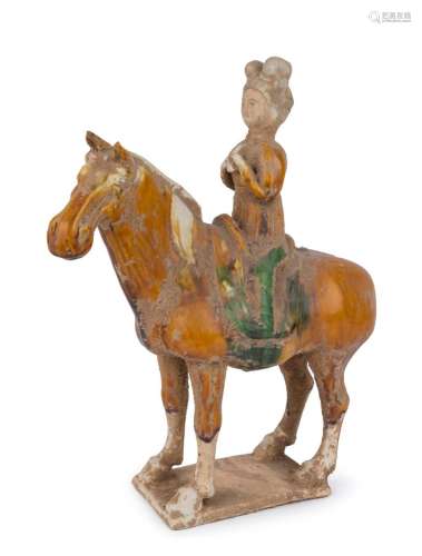 A Chinese Tang style pottery horse with rider, Qing Dynasty,...