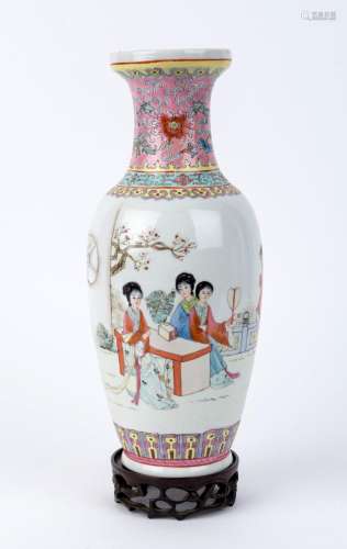 A Chinese famille rose porcelain vase with scene of women in...
