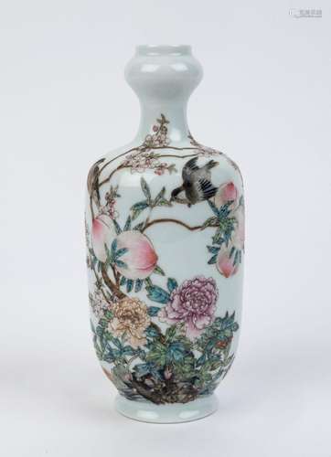 A Chinese porcelain vase with enamel decoration of birds, fr...