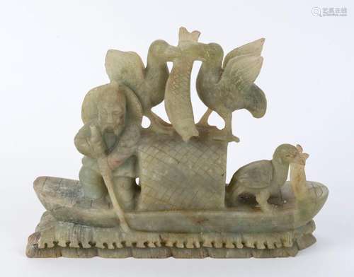 A Chinese carved jade fisherman ornament, 19th/20th century,...