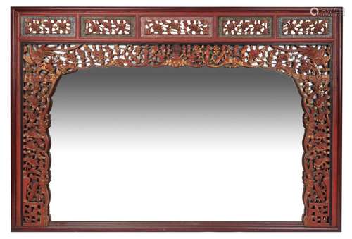 An impressive Chinese mirror, carved and lacquered wood with...