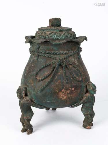 An archaic style Chinese bronze lidded vessel, 35cm high