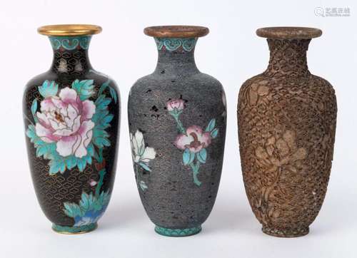 The phases of Chinese cloisonne in three vases, 20th century...