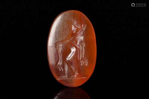 ROMAN CARNELIAN INTAGLIO DEPICTING A GENIUS