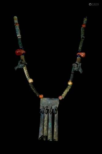 BRONZE AGE NECKLACE WITH AMULETS