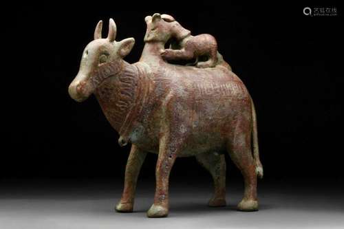 SELJUK BRONZE AND SILVER INLAY ANIMAL FIGURE