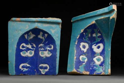 PAIR OF TUMURID GLAZED STONE NIECHES