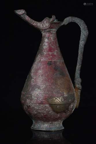 SELJUK BRONZE EWER WITH GEOMETRIC DESIGNS