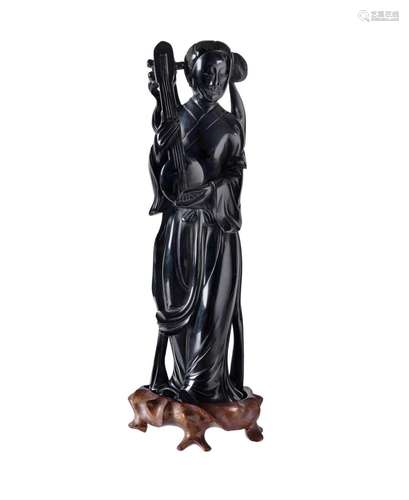 Early Chinese Carved Figure of a Courtesan. Depicted in trad...