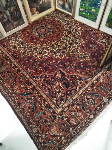 Very Large Bakhtiar Wool Carpet. Red ground with floral cent...