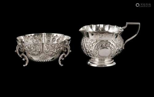 2 Late Victorian Sterling Silver Items. A small cream jug, c...