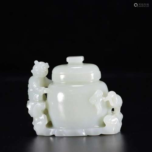 A Hetian Jade 'Boy Embracing A Vase' Decoration